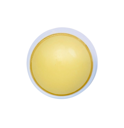 Round yellow perfecting serum stick with a white rim on a white background