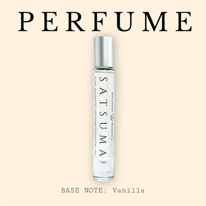Roll-on perfume bottle labeled 'Satsuma' with vanilla base note on a beige background.