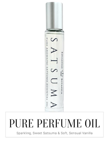 Bottle of Satsuma pure perfume oil with silver cap on a white background