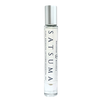 Pure Satsuma perfume oil in elegant glass bottle.