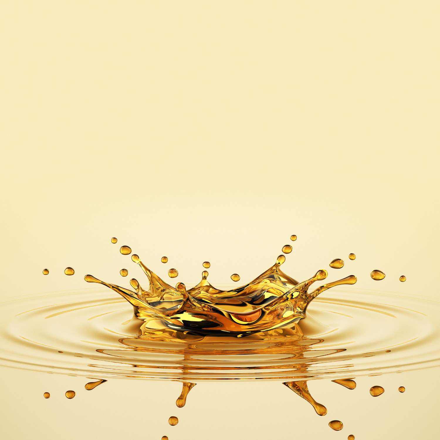 Gold liquid splash on a beige background